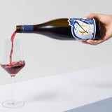 2024 Pinot Noir — being poured into a glass